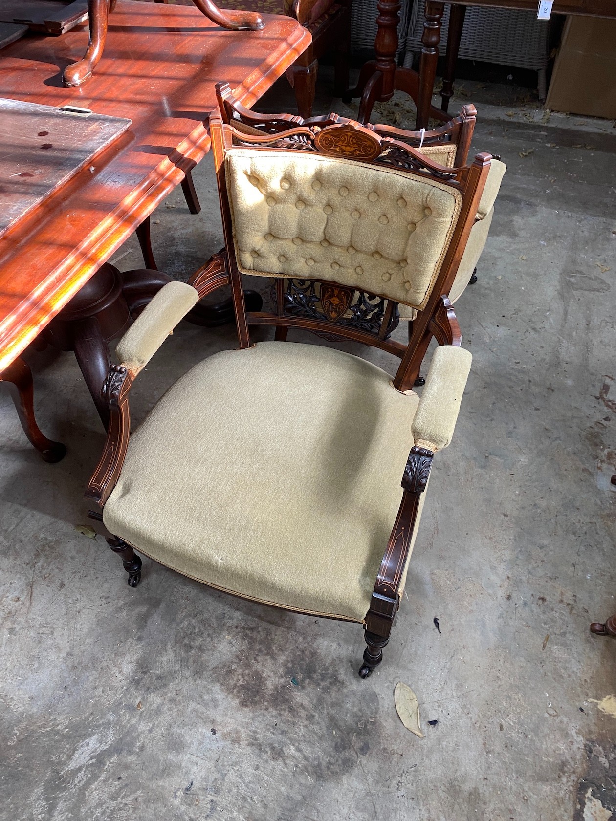 A pair of late Victorian inlaid rosewood salon chairs, width 63cm, depth 60cm, height 80cm